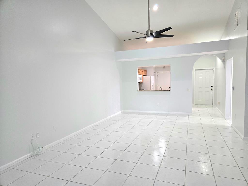 5912 Northwest 93rd Terrace Tamarac, FL 33321 - Photo 9 of 29 a view of an empty room with a window