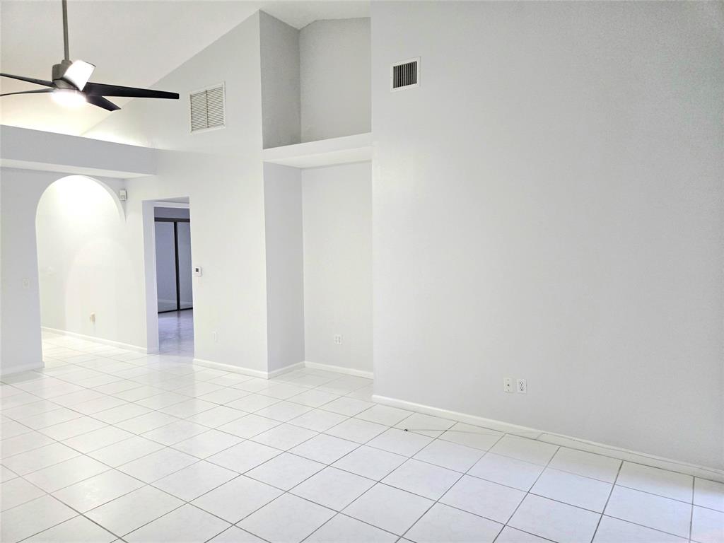 5912 Northwest 93rd Terrace Tamarac, FL 33321 - Photo 10 of 29 a view of an empty room