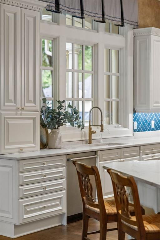 10955 Stroup Road Roswell, GA 30075 - Photo 16 of 73 a view of a dining room with furniture and windows