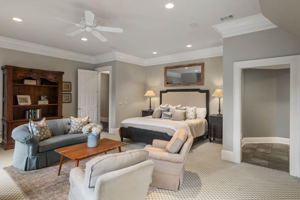 10955 Stroup Road Roswell, GA 30075 - Photo 43 of 73 a bedroom with furniture and a ceiling fan
