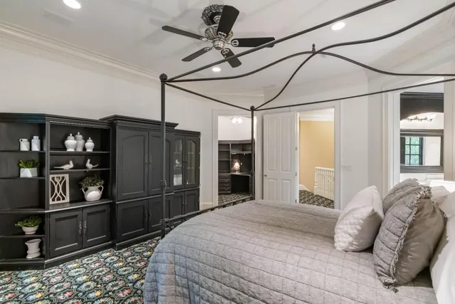 a front view of a house with a yard table and chairs