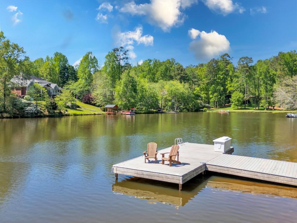 10955 Stroup Road Roswell, GA 30075 - Photo 67 of 73 a view of a lake with chairs