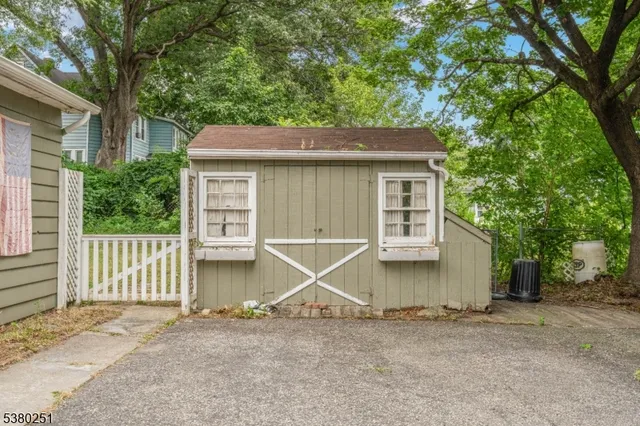 a house with trees in the background