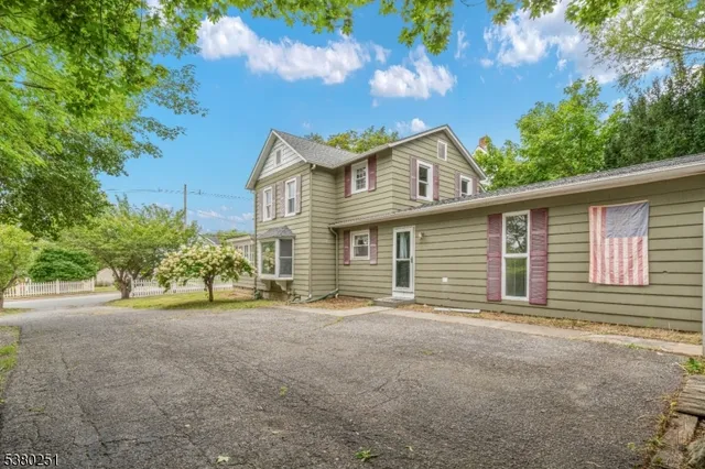 front view of a house with a street