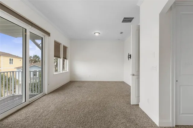 a view of a chairs and table in the patio