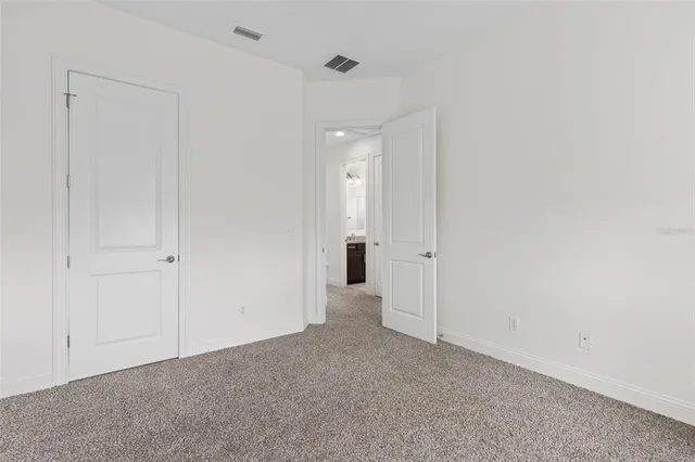 a view of a lake with a city view