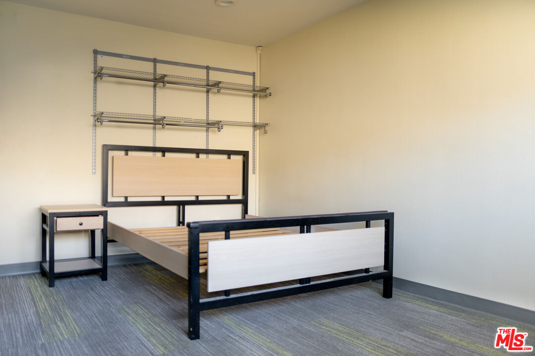 920 West 28th Street Los Angeles, CA 90007 - Photo 3 of 7 a view of a room with wooden floor and small window