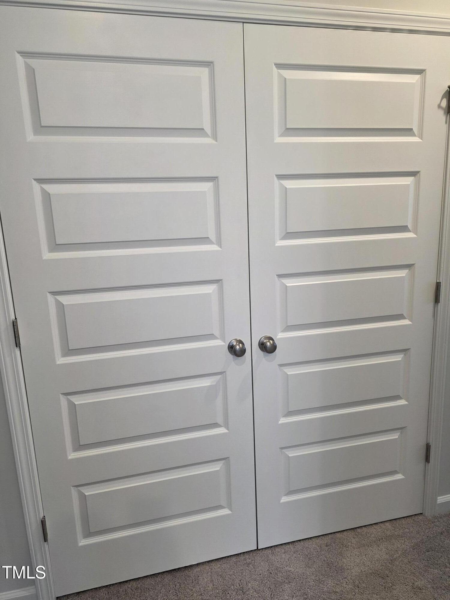 27 Nettle Lane Clayton, NC 27520 - Photo 18 of 37 a view of walk in closet