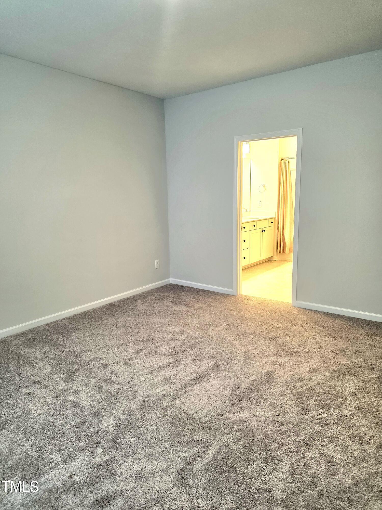 27 Nettle Lane Clayton, NC 27520 - Photo 29 of 37 a view of an empty room and a window