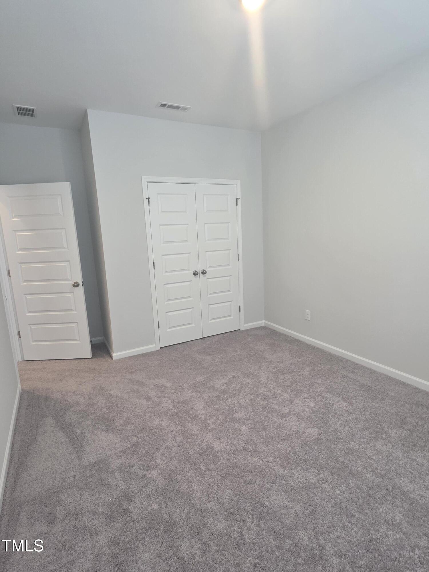 27 Nettle Lane Clayton, NC 27520 - Photo 31 of 37 an empty room with closet