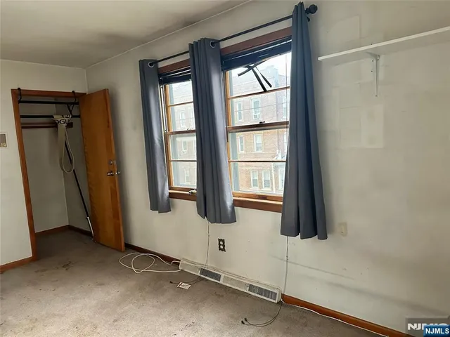 a view of a closet and window