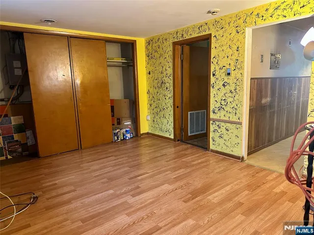 a view of entryway with wooden floor