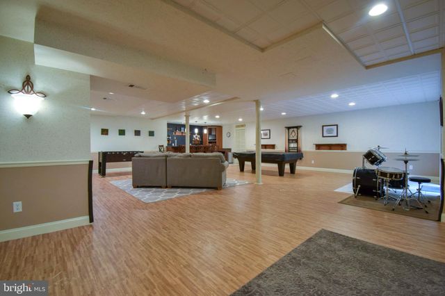 a room with lots of furniture and a table