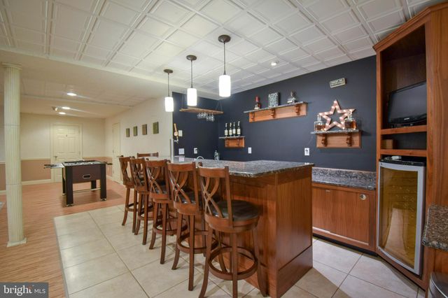 a large kitchen counter space a large island in the center