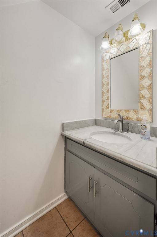 4820 Cedar Cliff Road Chester, VA 23831 - Photo 19 of 41 Bathroom vanity with a gray cabinet, countertop wi