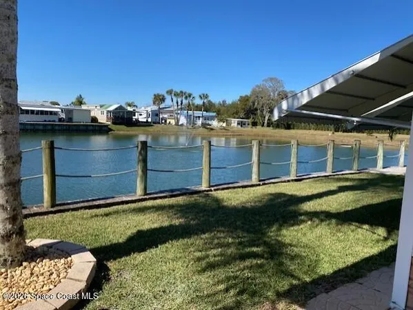 a view of a backyard with plants