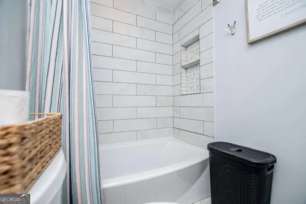 a bathroom with a bathtub