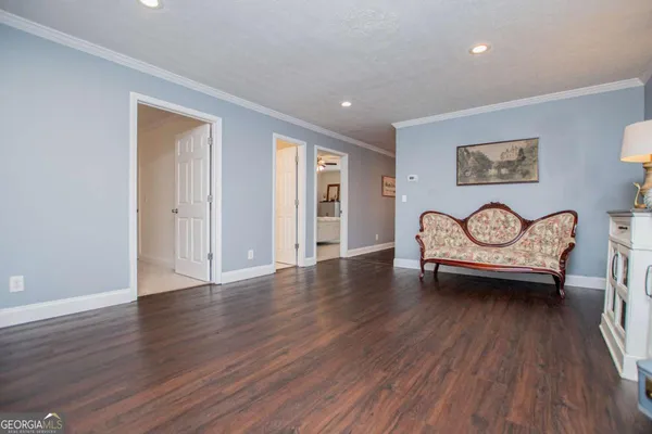a view of livingroom with furniture wooden floor and window