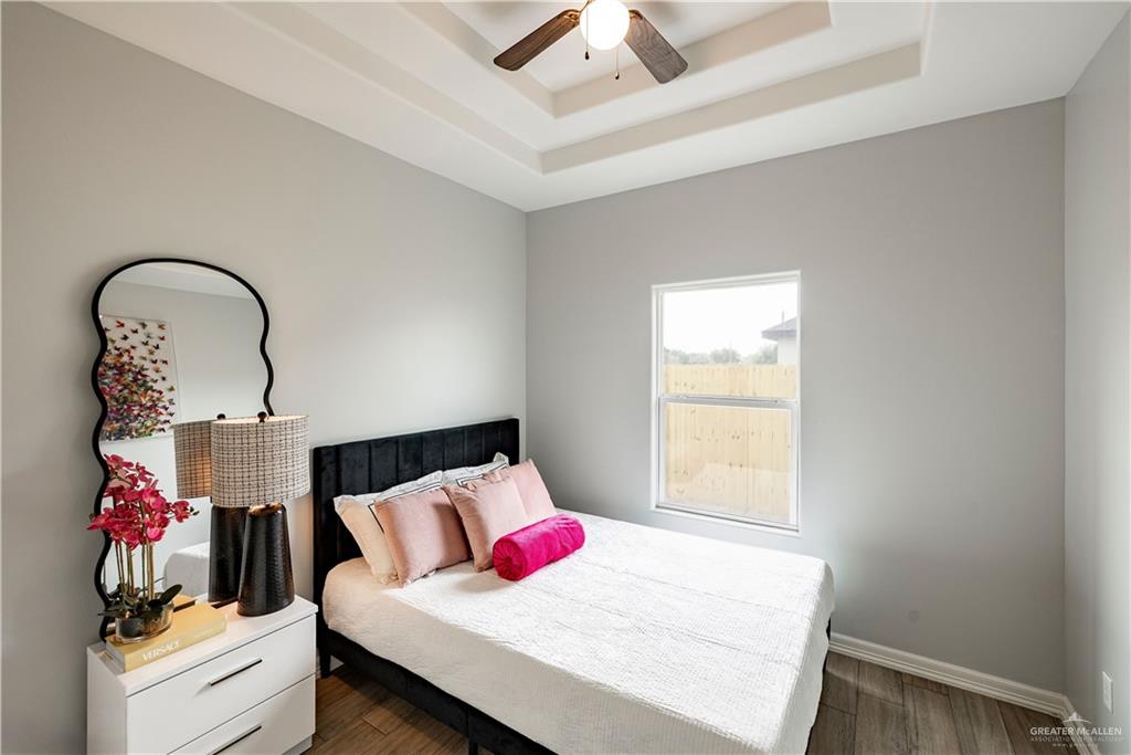 500 Bridget Street Weslaco, TX 78596 - Photo 7 of 14 a bedroom with a bed and a dresser
