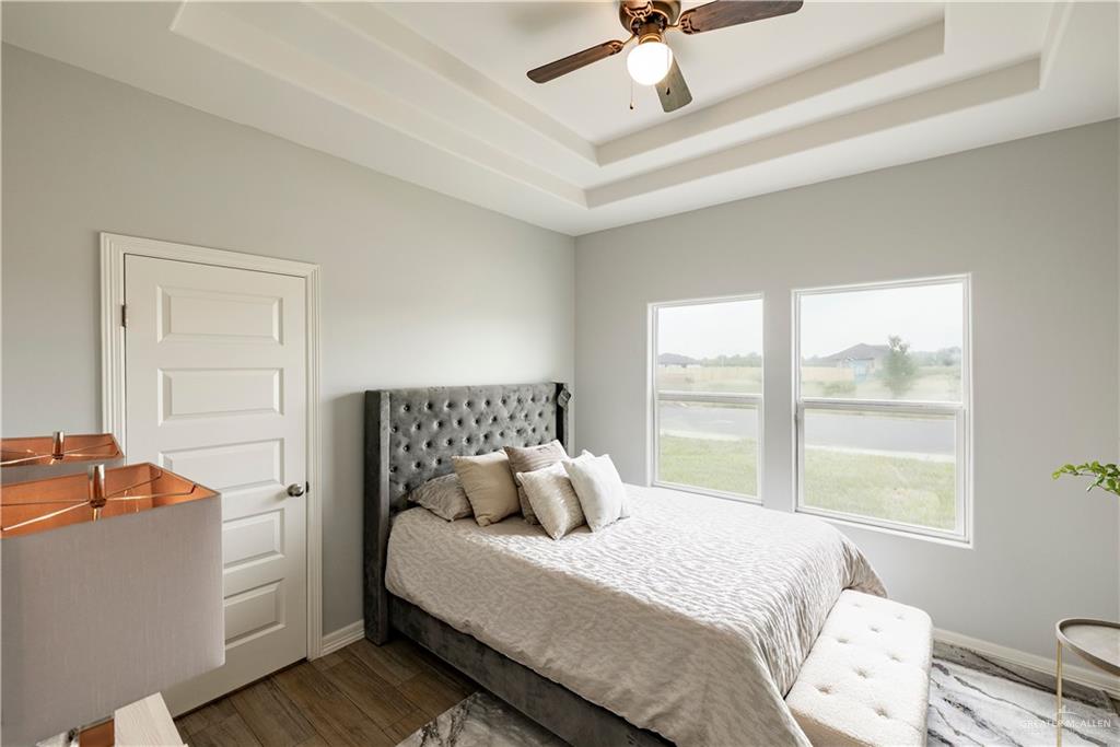 500 Bridget Street Weslaco, TX 78596 - Photo 9 of 14 a bedroom with a bed and a window
