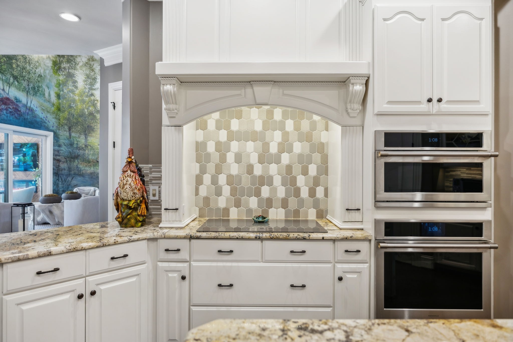 3235 Kinnard Springs Road Franklin, TN 37064 - Photo 27 of 99 a kitchen with granite countertop white cabinets and stainless steel appliances