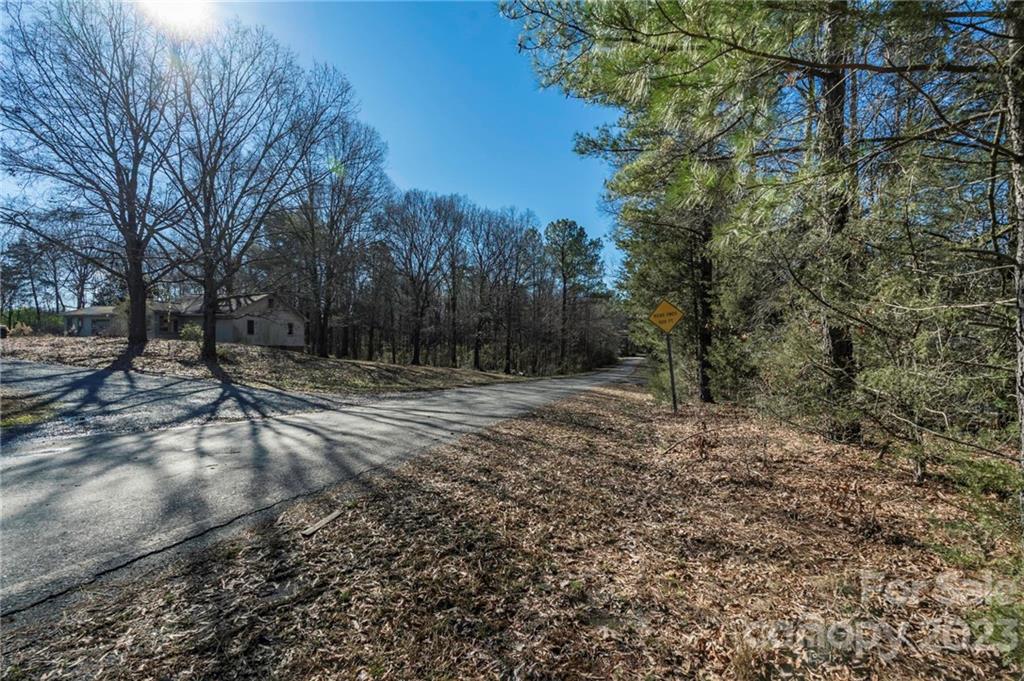 7607 Tesh Road Monroe, NC 28110 - Photo 18 of 31 a view of outdoor space with trees