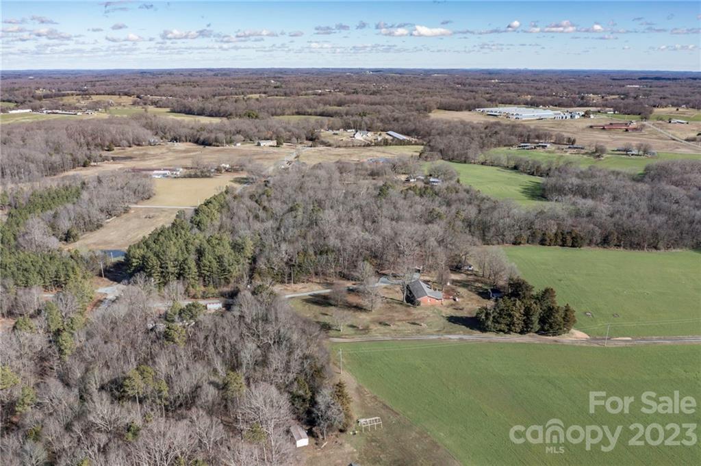 7607 Tesh Road Monroe, NC 28110 - Photo 2 of 31 an aerial view of a houses with outdoor space