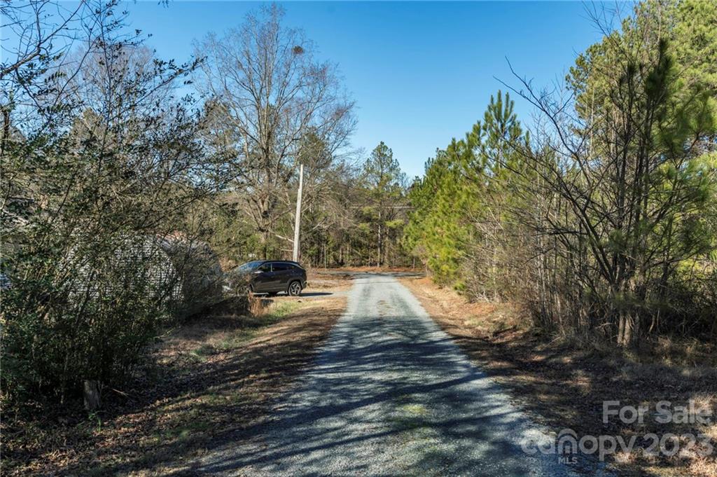 7607 Tesh Road Monroe, NC 28110 - Photo 27 of 31 a view of a backyard of the house