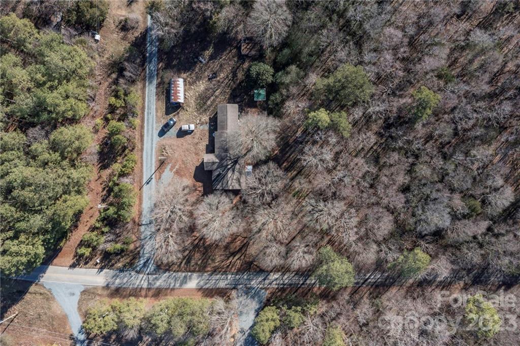 7607 Tesh Road Monroe, NC 28110 - Photo 5 of 31 a view of a forest with a tree