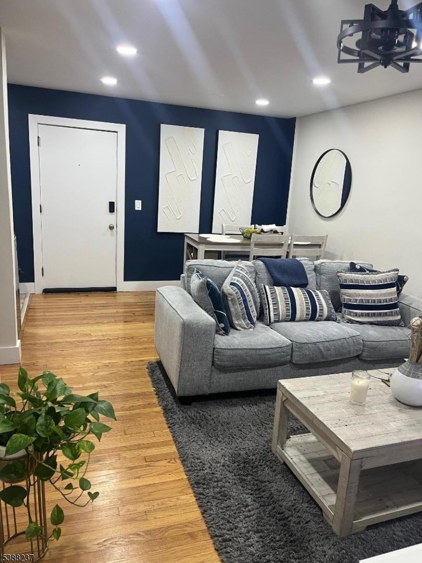 744 Hazard Place, Unit 1F Elizabeth, NJ 07208 - Photo 1 of 12 a living room with furniture