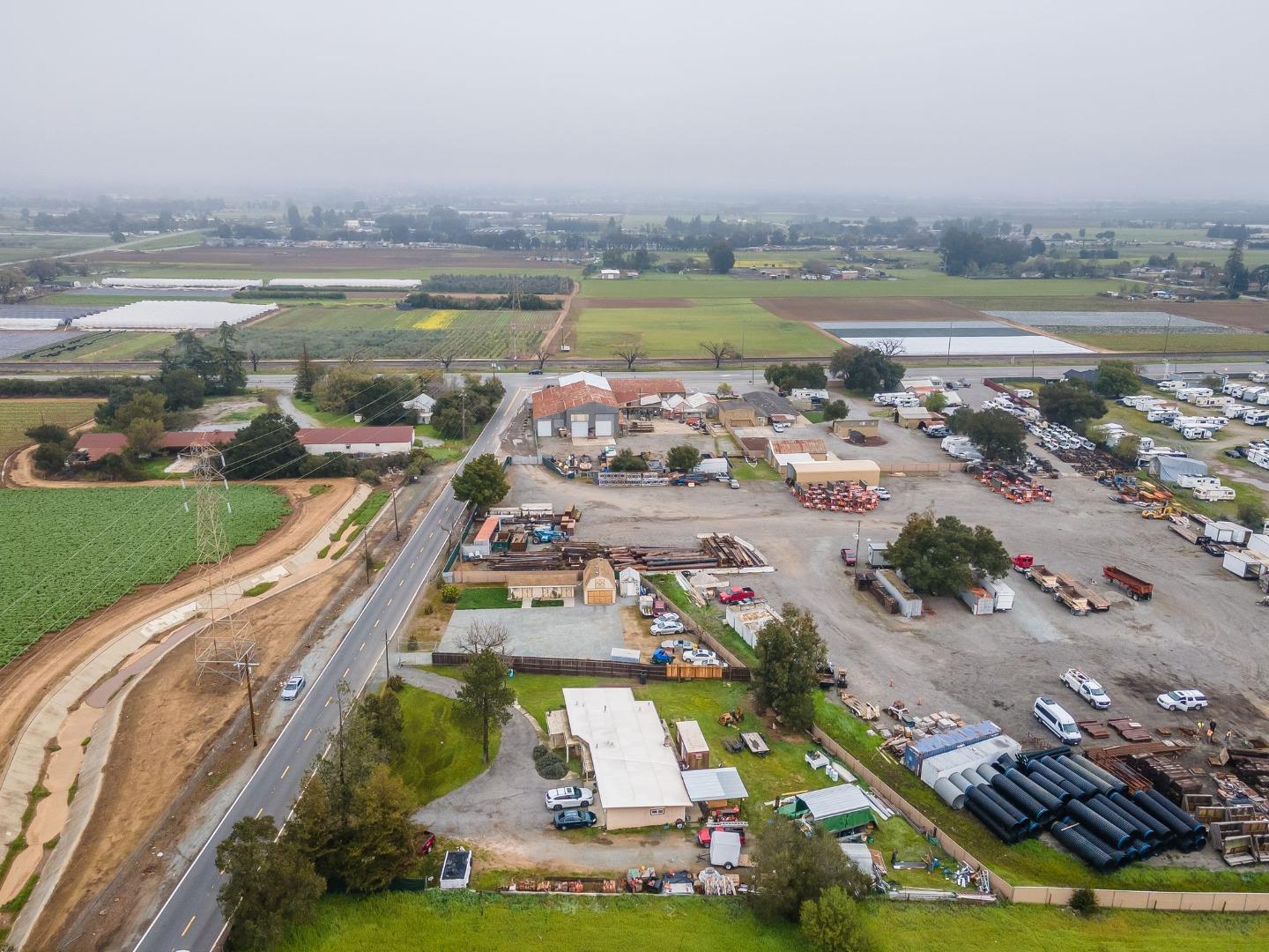 130 Day Road Gilroy, CA 95020 - Photo 18 of 27 an aerial view of a house with a lake view