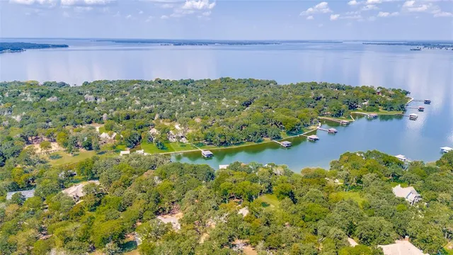a view of a lake with a building in the background