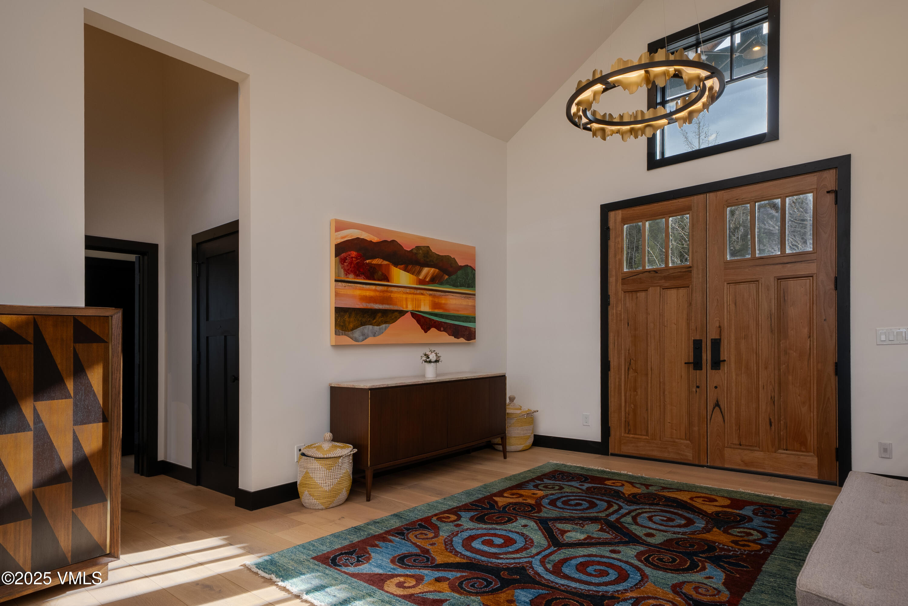 533 Settlers Loop Edwards, CO 81632 - Photo 2 of 29 a view of an entryway with wooden floor
