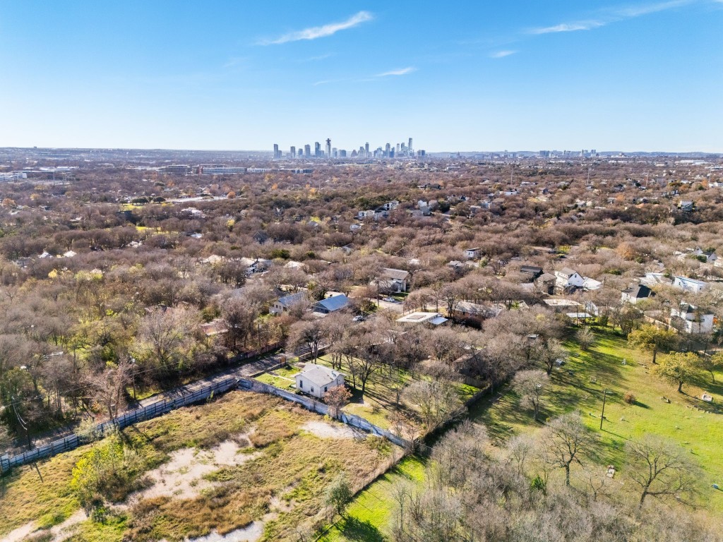5610 Hudson Street Austin, TX 78721 - Photo 14 of 34 an aerial view of residential house with yard and mountain view in back