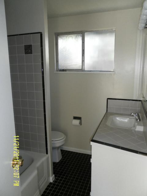 1230 Mercedes Lane Santa Barbara, CA 93101 - Photo 11 of 13 a bathroom with a sink a toilet and shower