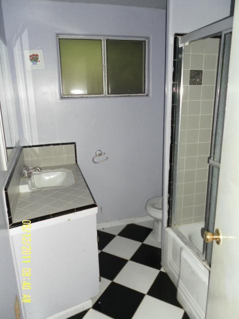 1230 Mercedes Lane Santa Barbara, CA 93101 - Photo 12 of 13 a bathroom with a sink toilet and shower