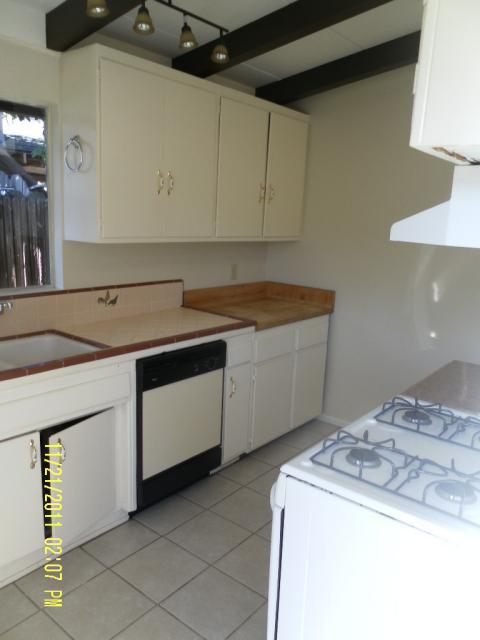 1230 Mercedes Lane Santa Barbara, CA 93101 - Photo 3 of 13 a utility room with sink washer and dryer