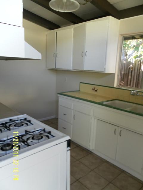 1230 Mercedes Lane Santa Barbara, CA 93101 - Photo 4 of 13 a utility room with sink dryer and washer