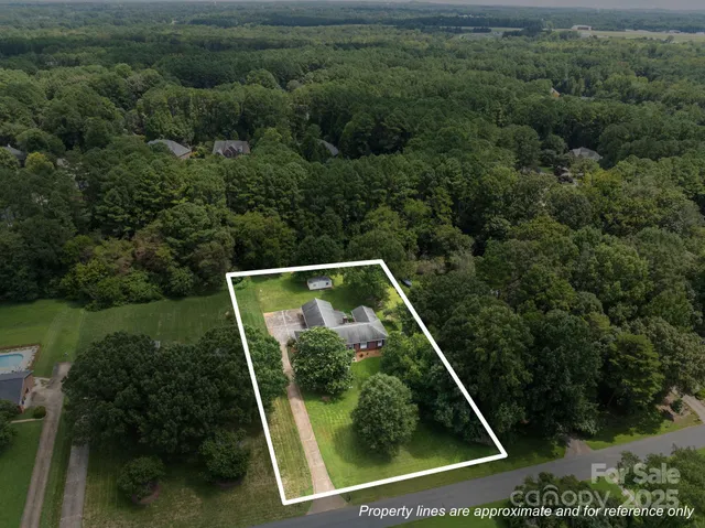 a view of a lake with a yard