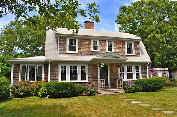 9 Wianno Road Marion, MA 02738 - Photo 1 of 10 a front view of a house with a yard
