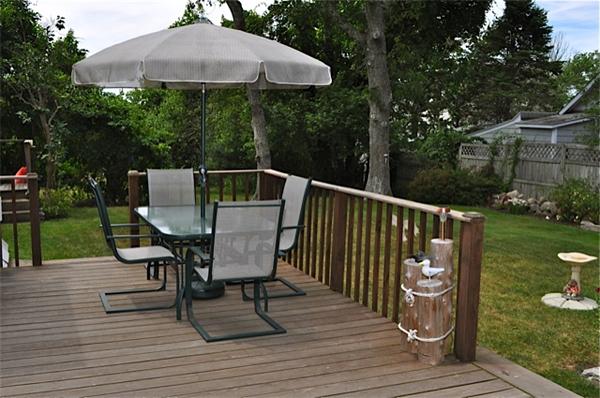 9 Wianno Road Marion, MA 02738 - Photo 2 of 10 a deck view with a seating space