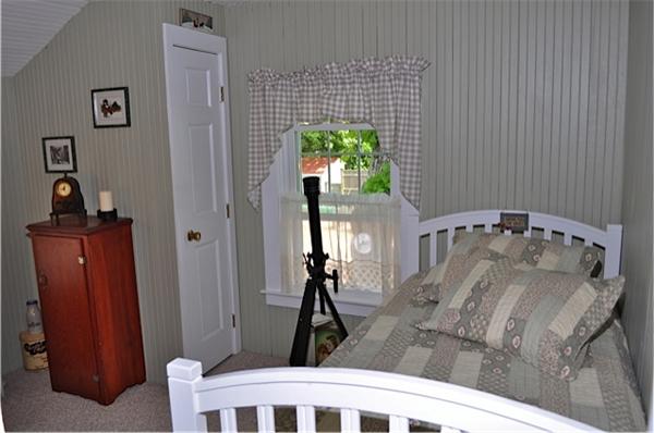 9 Wianno Road Marion, MA 02738 - Photo 10 of 10 a bedroom with a bed and a window