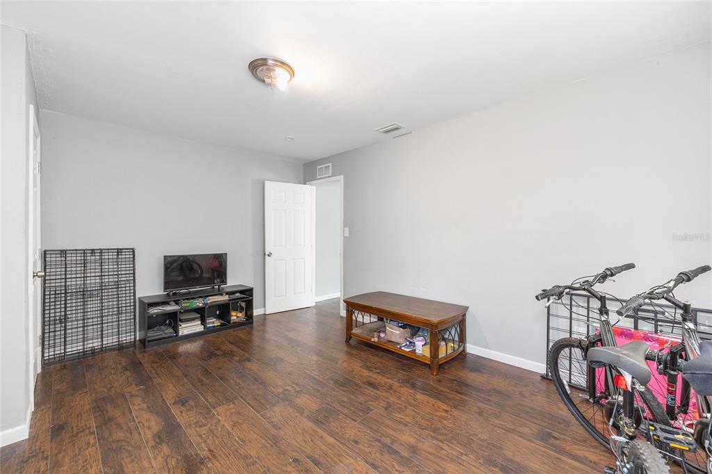 15120 Northeast 35th Avenue Road Citra, FL 32113 - Photo 19 of 34 a view of a livingroom with furniture and toys