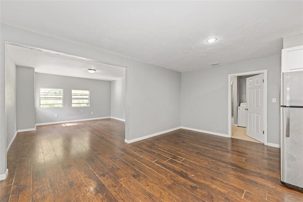 15120 Northeast 35th Avenue Road Citra, FL 32113 - Photo 24 of 34 a view of an empty room and window and wooden floor