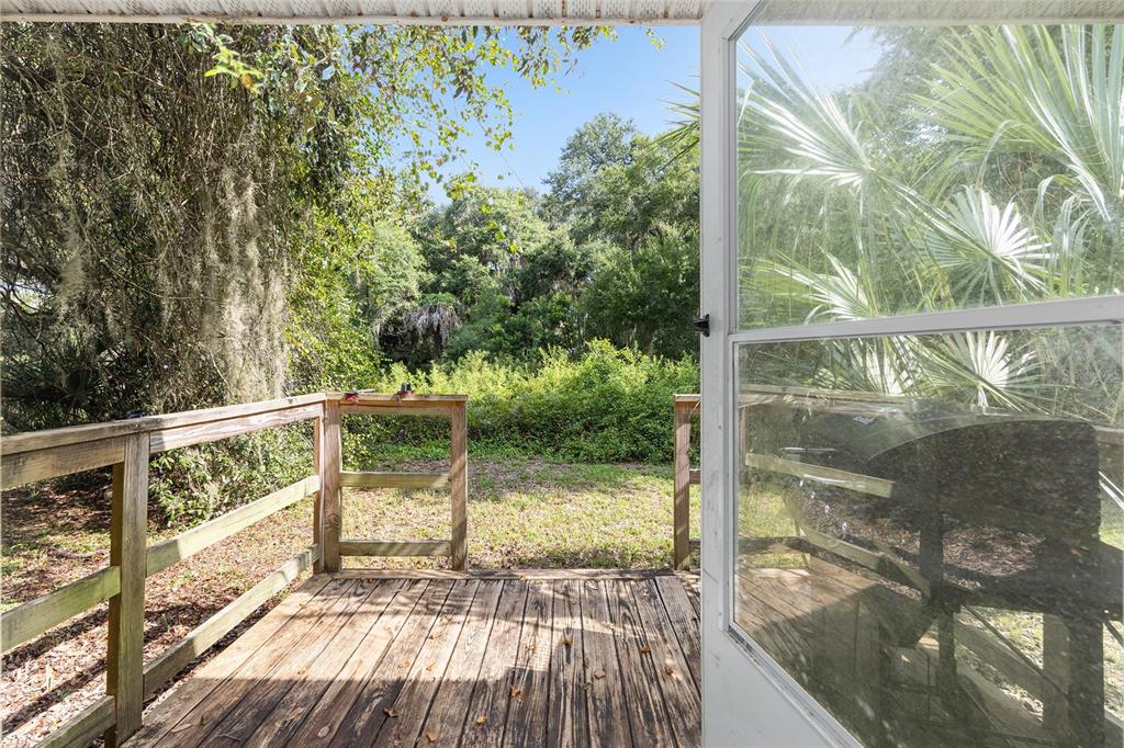 15120 Northeast 35th Avenue Road Citra, FL 32113 - Photo 26 of 34 a view of balcony with wooden floor