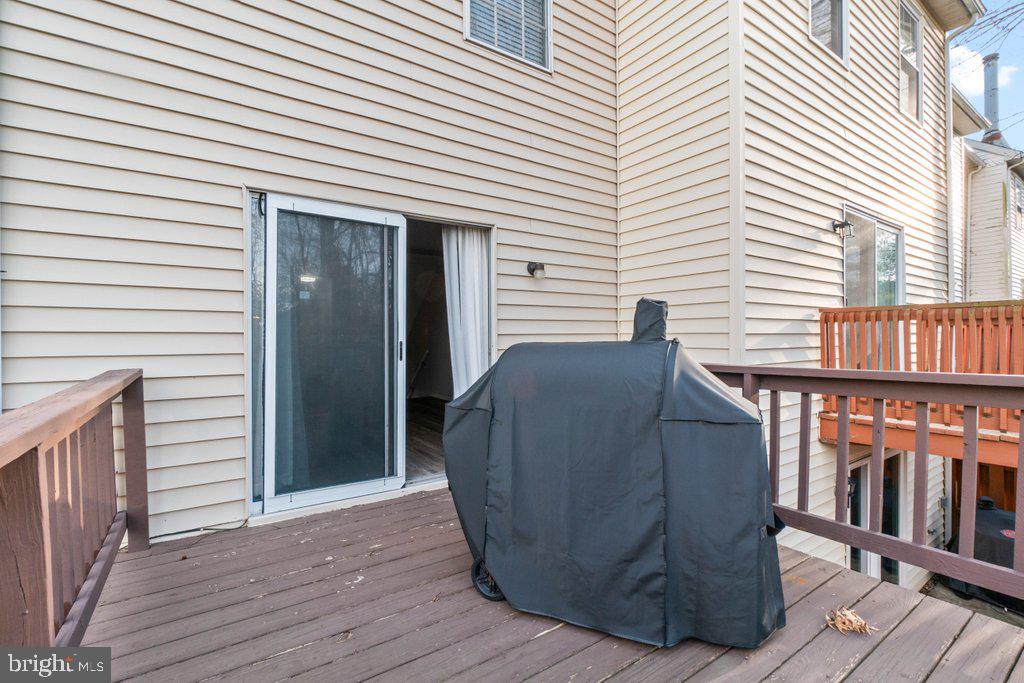 2412 Potterfield Road Windsor Mill, MD 21244 - Photo 20 of 36 a view of a house with a deck