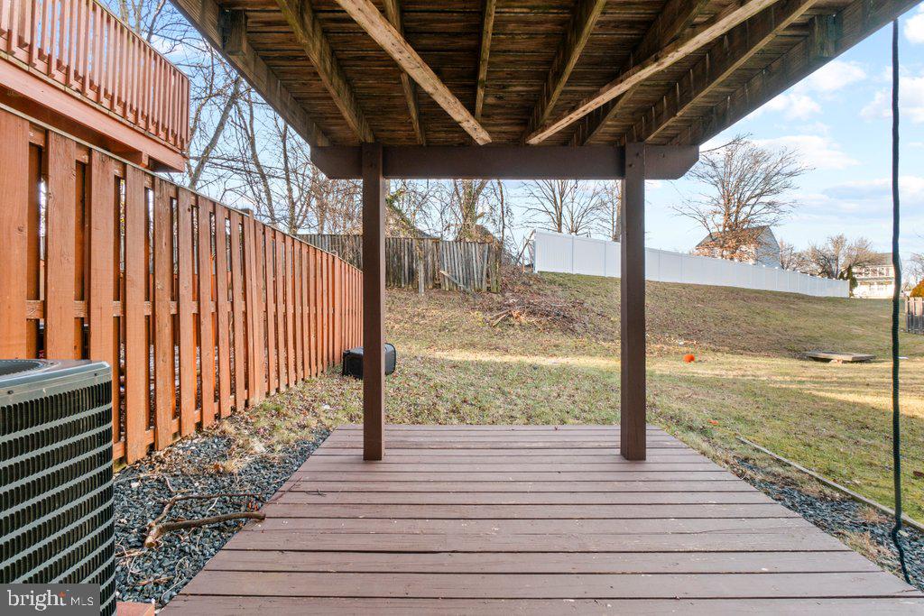 2412 Potterfield Road Windsor Mill, MD 21244 - Photo 36 of 36 a view of a balcony with wooden floor