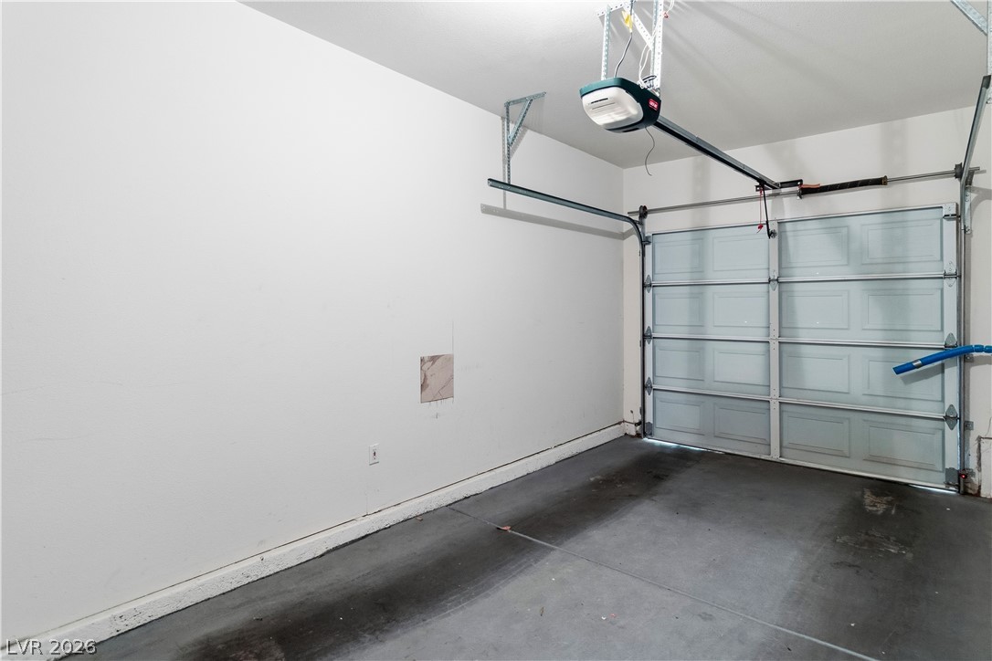 3350 Pheasant Canyon Way, Unit 1008 Laughlin, NV 89029 - Photo 37 of 80 Garage featuring a garage door opener