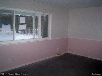 18971 Sumpter Road Belleville, MI 48111 - Photo 3 of 7 18971 sumpter 2nd bedroom.jpg
