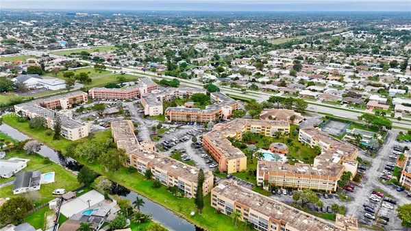 an aerial view of a city with lots of residential buildings